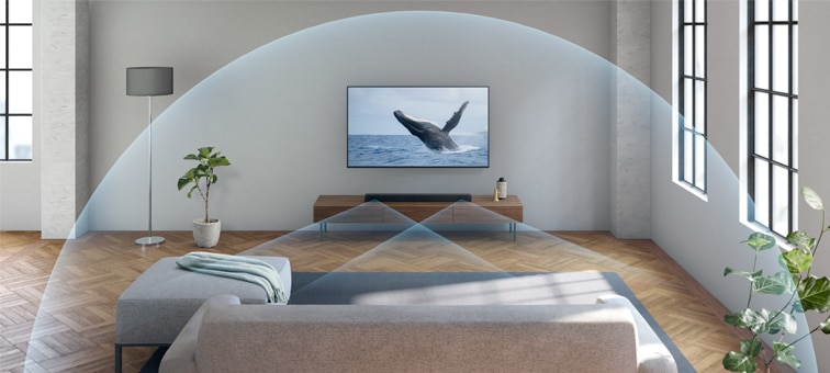 Kanapé a tévé előtt, a hangprojektorból pedig hanghullámok áradnak a szobába