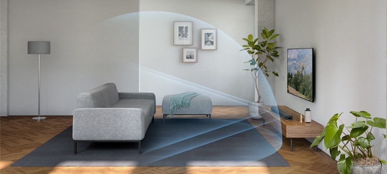 Kanapé a tévé előtt, a hangprojektorból pedig hanghullámok áradnak a szobába